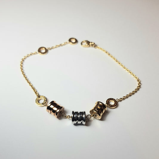 BVLGARI - Bracciale in oro giallo 18k B.zero1 con 3 pendenti